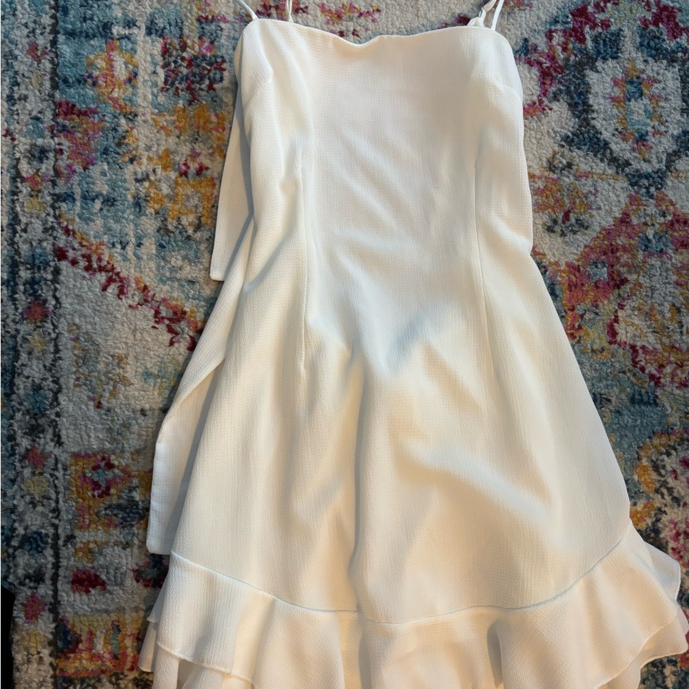 White ruffled mini dress